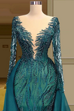Teal evening gown with intricate beading on a mannequin against a neutral background