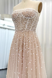 Beaded dress on a mannequin with a neutral background