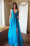 Woman wearing a blue evening gown with a slit in a room.