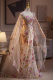 Floral dress on a mannequin in a room with decor elements.
