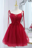 Red dress on a mannequin against a white background