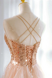 Beige sequin dress on a mannequin with a white background