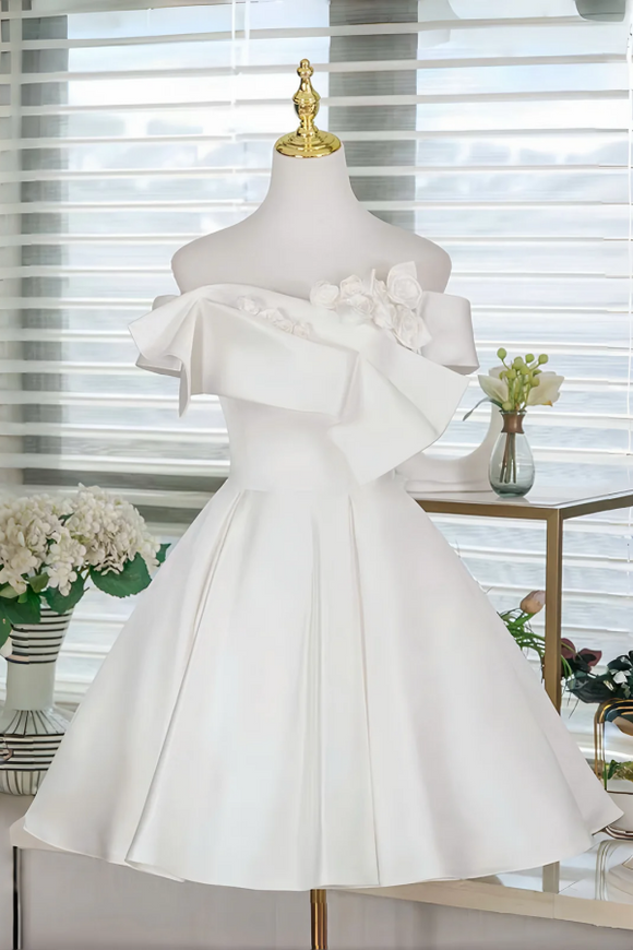 White dress on a mannequin with a blurred indoor background