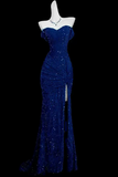 Navy blue strapless gown on a mannequin against a white background