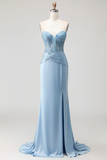 Light blue evening gown on a mannequin against a white background