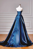 Blue satin evening gown on a mannequin against a neutral background