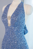 Blue sequin dress on a mannequin against a white background