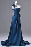 Blue evening gown on a mannequin against a gray background