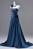 Blue evening gown on a mannequin against a gray background
