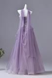 Lavender evening gown on a mannequin against a gray background