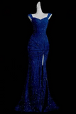 Blue evening gown on a mannequin against a black background