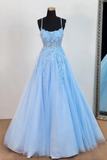 Light blue evening gown on a mannequin against a white wall.