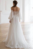 White wedding dress with long sleeves in a bright room