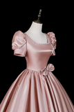 Elegant Pink Satin Ball Gown with Pearl Trim & Bow Detail KPP2377