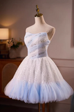 White and blue gradient dress on a mannequin against a neutral background