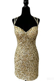 Gold sequin dress on a mannequin against a white background