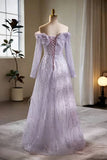 Elegant purple evening gown on a mannequin against a neutral background